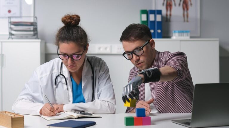 young-female-physiotherapist-watch-patient-using-hand-prosthesis-write-down-results_867394-288